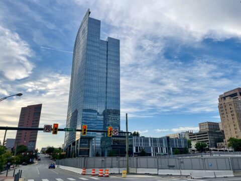 Photo of Dominion headquarters building on nice day, from the ground level